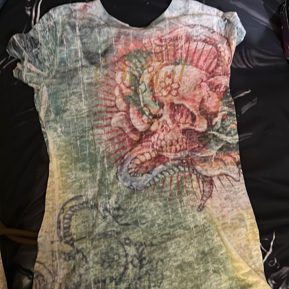 Sinful brand. Very cool shirt
